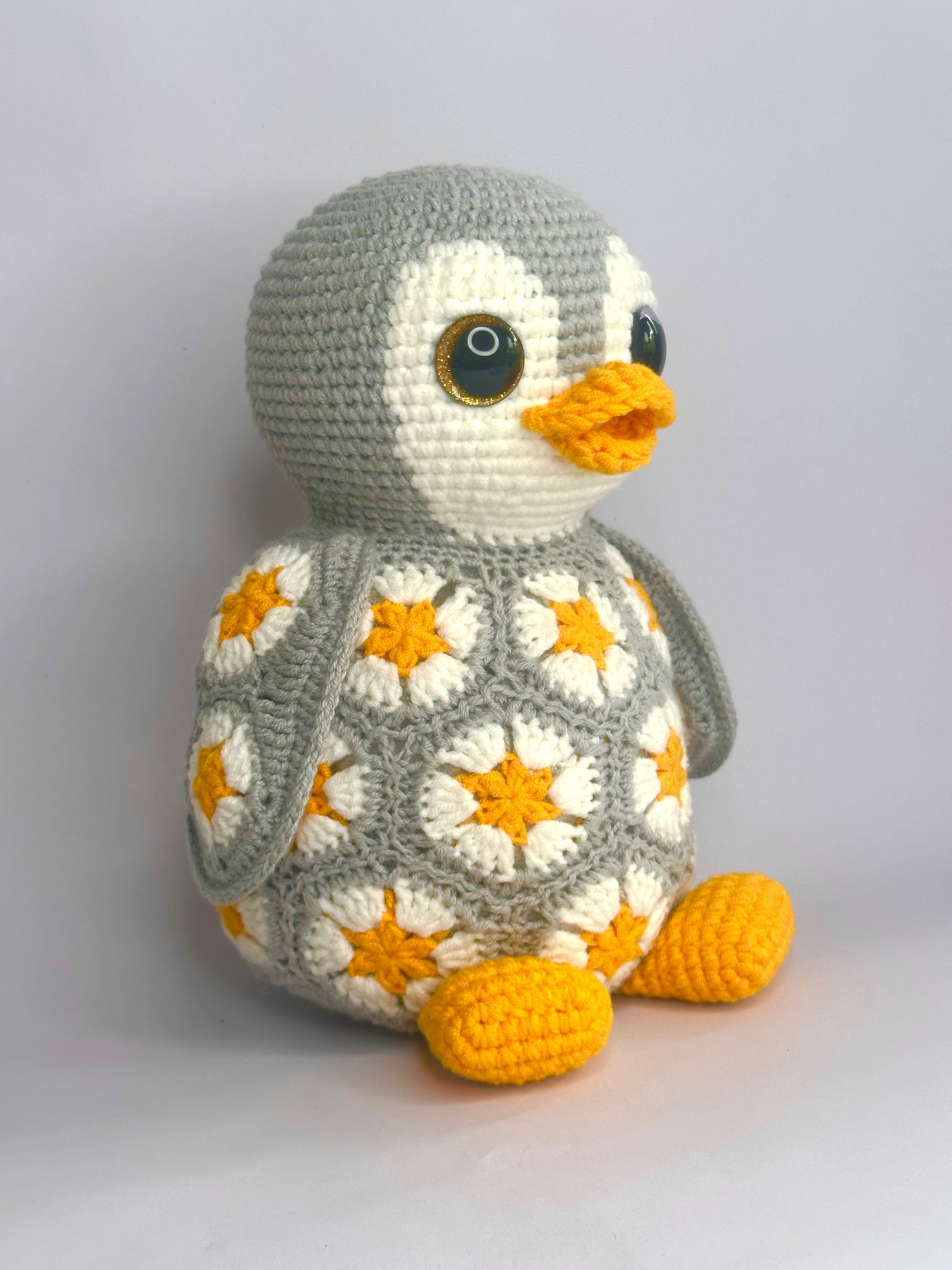 Pingouin en fleurs africaines – Modèle de crochet