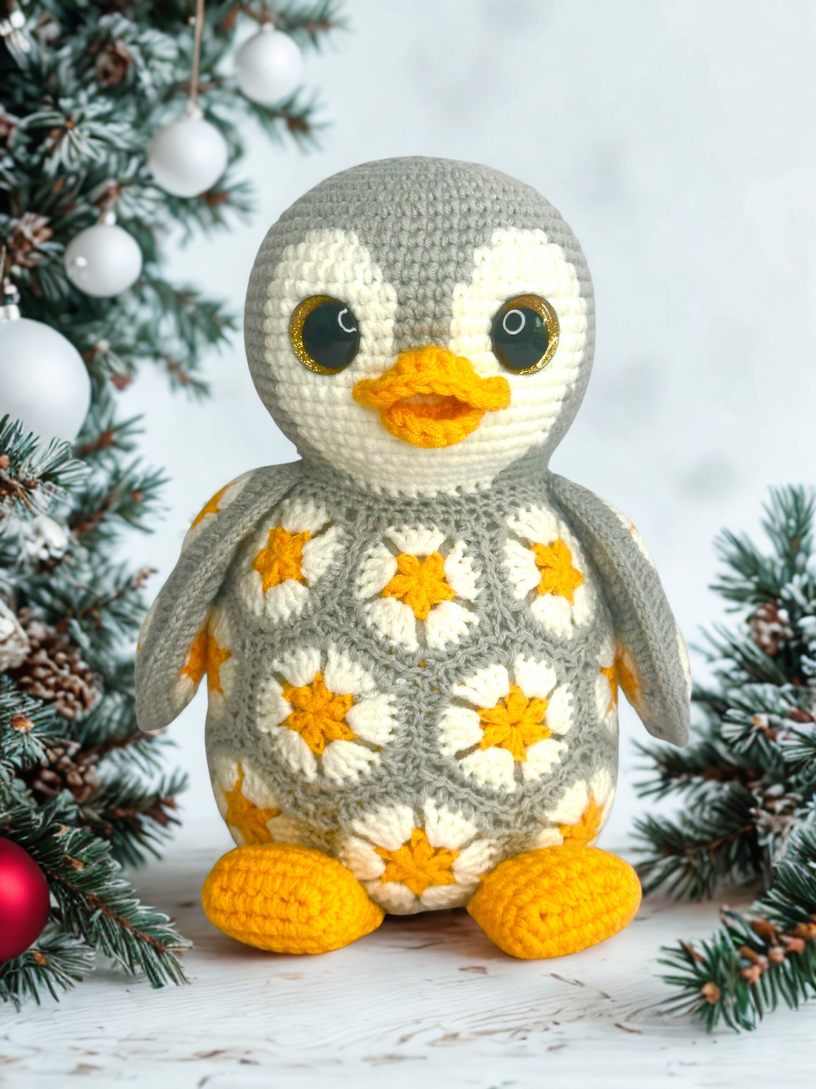 Pingouin en fleurs africaines – Modèle de crochet